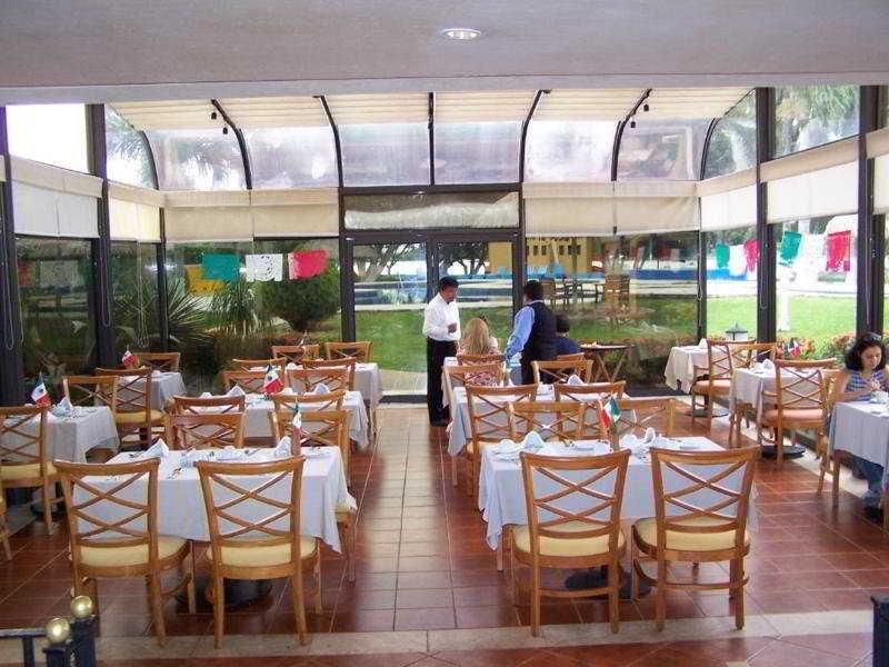 Hotel Terranova 코아트사코알코스 외부 사진 Restaurant in the hotel